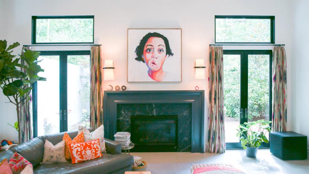 Stop-motion video still showing a woman blowing a bubble.